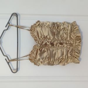 Super cute gold ruffle top